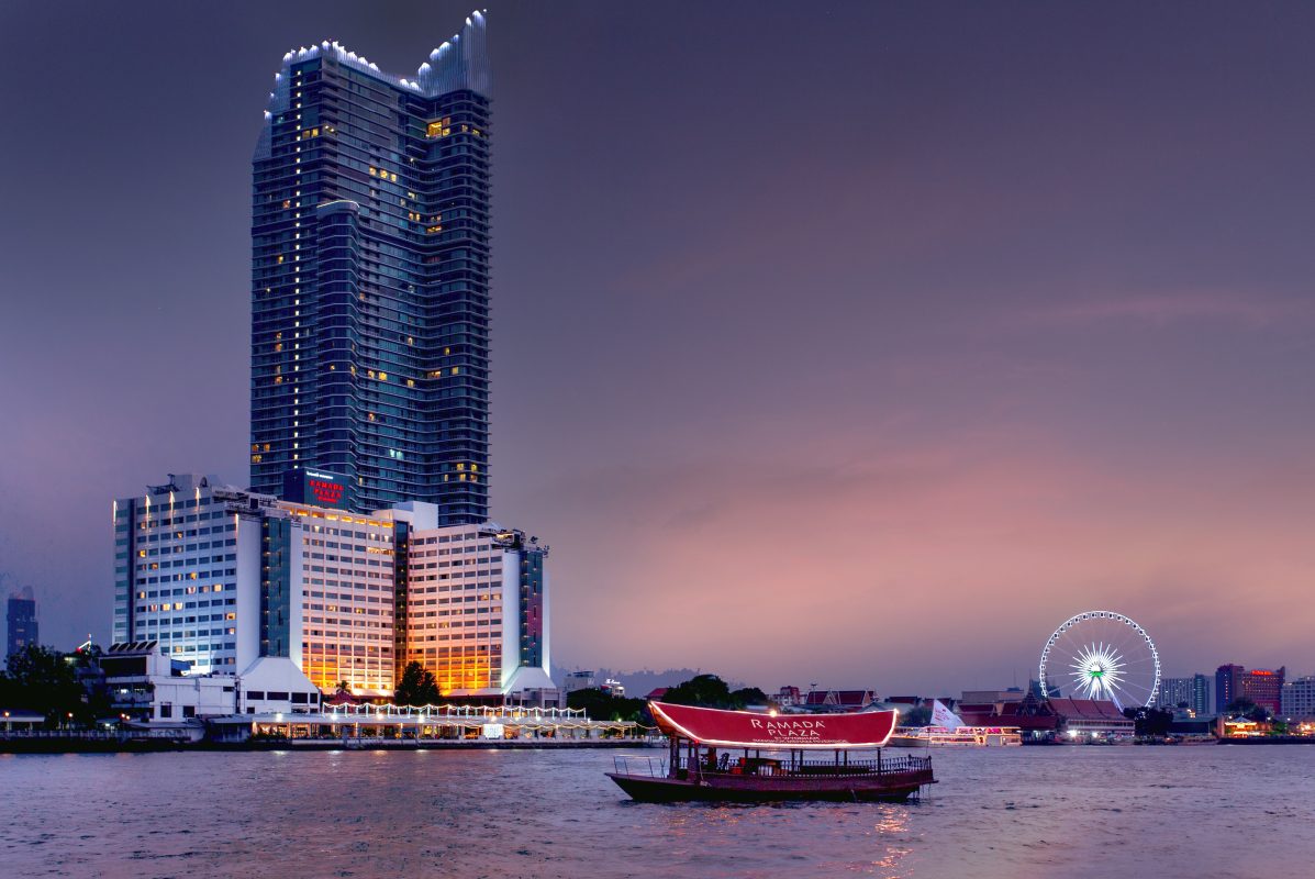 ramada plaza by wyndham bangkok menam riverside night time boating